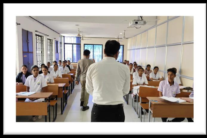 Trainer interacting with students